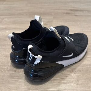 Nike Women's Black and White Slip-On Sneakers